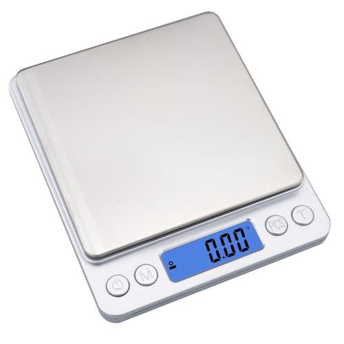 ميزان دقيق وتصميم نحيف بـشاشة LCD