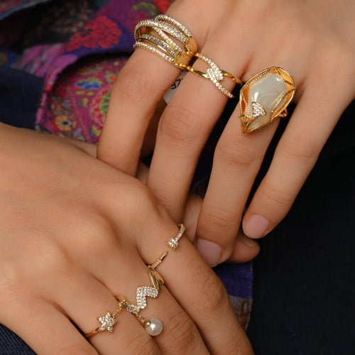 مجموعه خواتم ذهبي مرصع بزركون تكمّل أناقتك