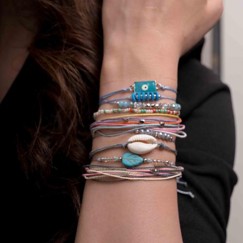 مجموعه أساور 9 قطع مع خرز و صدفة البحر و خيوط ملون...