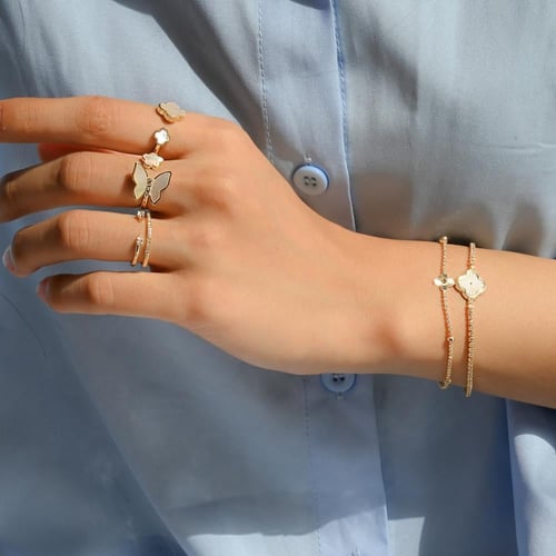 أطقم مجوهرات ذهبي ( أساور مع خواتم ) بتصاميم ورود...