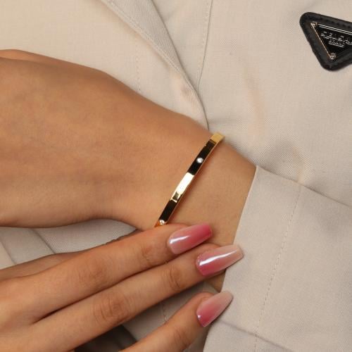 اسورة ستانلس ستيل قياس 55 رفيعة بفصوص