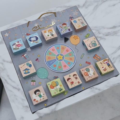 استاند البوكسات مع عجلة الحظ الدوارة | 12 علبة