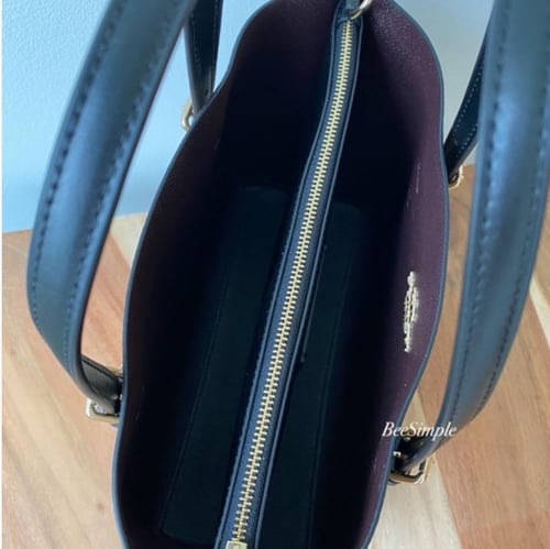 حقيبة كوتش بني غامق