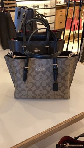 حقيبة كوتش بني غامق