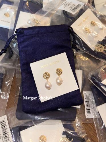 حلق tory burch ذهبي