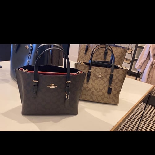 حقيبة كوتش بني غامق