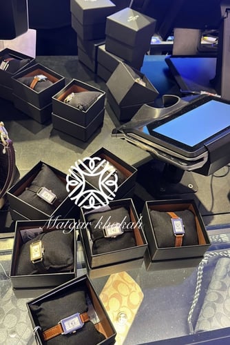 ساعة كوتش أسود