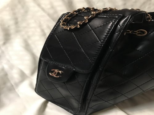 شنطة شانيل 25 اسود وذهبي - CHANEL