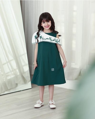 فستان أخضر شعار المملكة