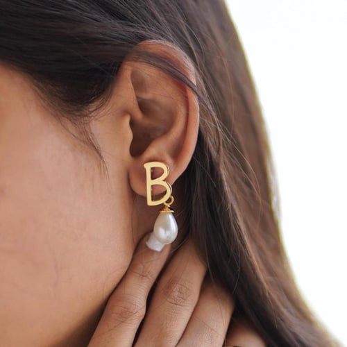 أقراط اللؤلؤ بالانجليزي