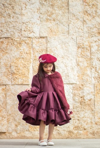 فستان فاخر من التفته باللون العودي المميز