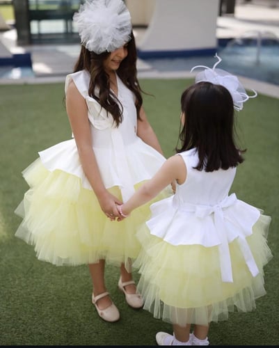 فستان أطفال باللون الأصفر الفاتح من الشانتون