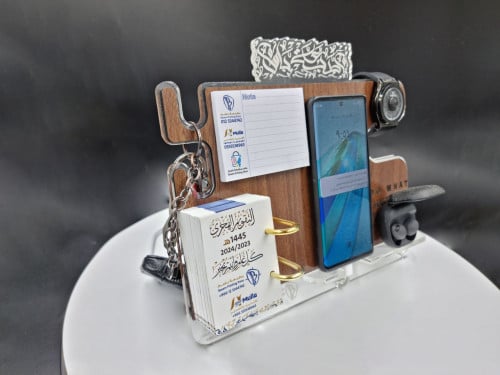 استاند ( تقويم + الجوال + ساعة + سماعة + مذكرة)