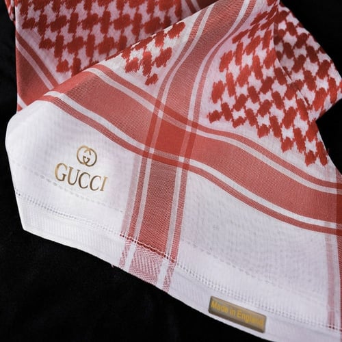 شماغ قوتشى الذهبي2022