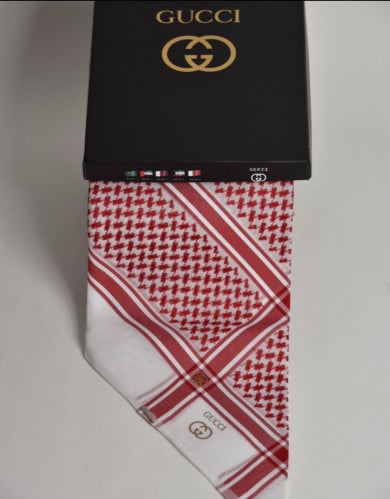 شماغ قوتشى الذهبي2022