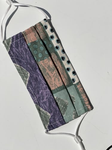 كمامه قماشيه مع قطعه لتصغير وتكبيير مقاس المطاط