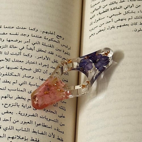 داعم اصبع للقراءة ( وردي-بنفسجي )