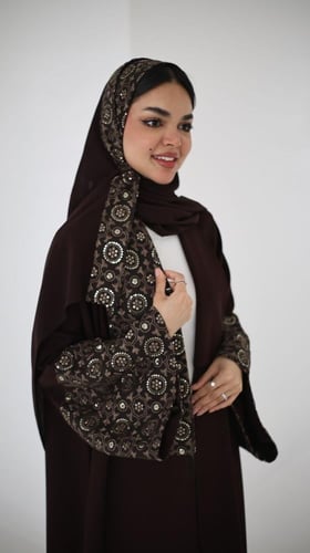 عباية ( اسماء بني غامق ) كريب مع شك وتطريز