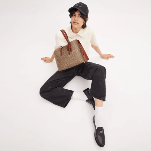 كوتش | Carter Carryall In Signature Canvas