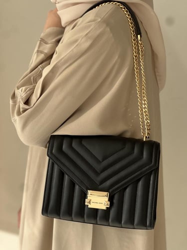 مايكل كورس | Michael Kors