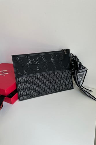 كارولينا هيريرا | SHOPPING | CONTINENTAL POUCH