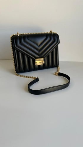 مايكل كورس | Michael Kors