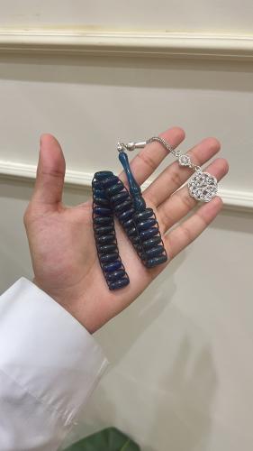 يوناني فيروزي غامق