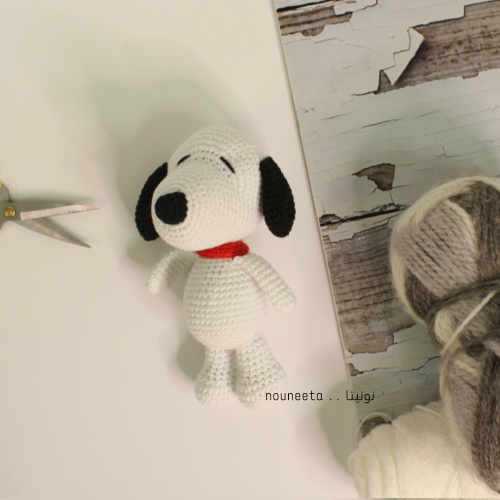 دمية سنوبي من خيوط السعادة