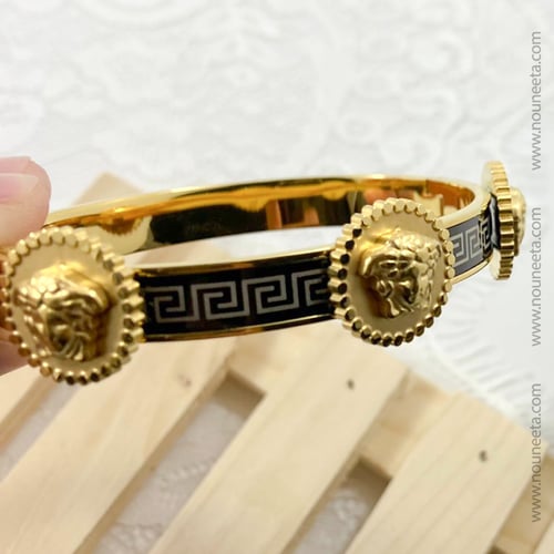 سوار فيرزاتشي ذهبي وأسود 1