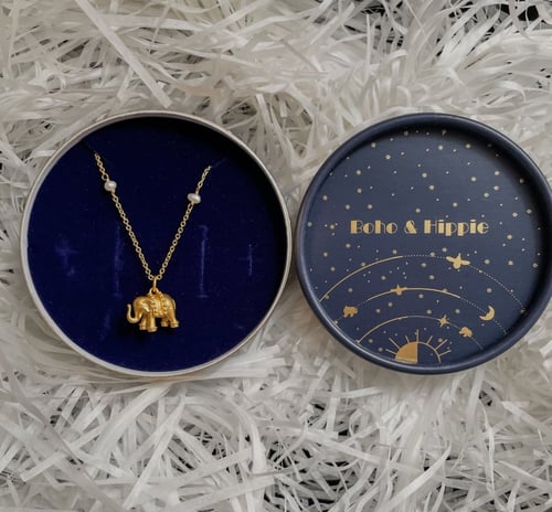 Golden elephant necklace