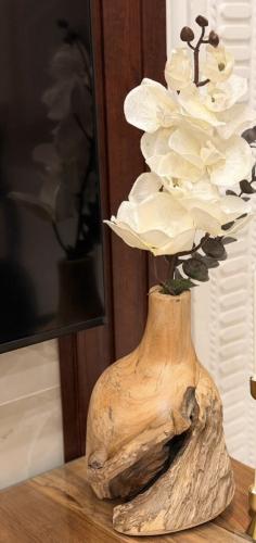 Teak wood vase, height 29 cm