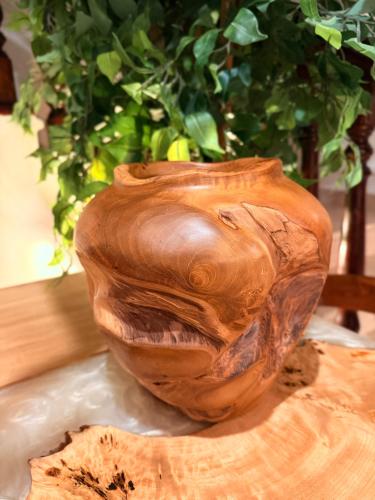 A vase made of natural wood