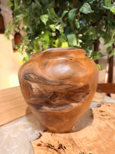 A vase made of natural wood
