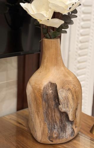 Teak wood vase, height 29 cm