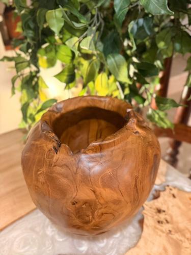 A vase made of natural wood
