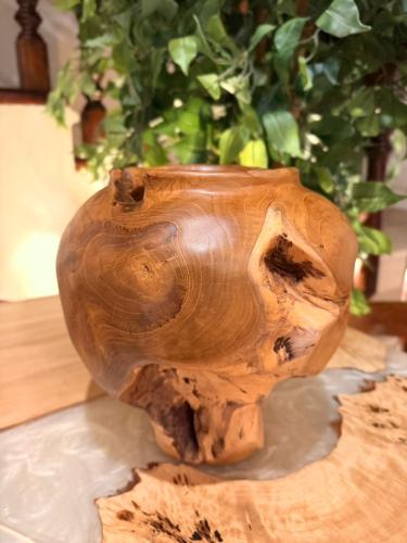 A vase made of natural wood