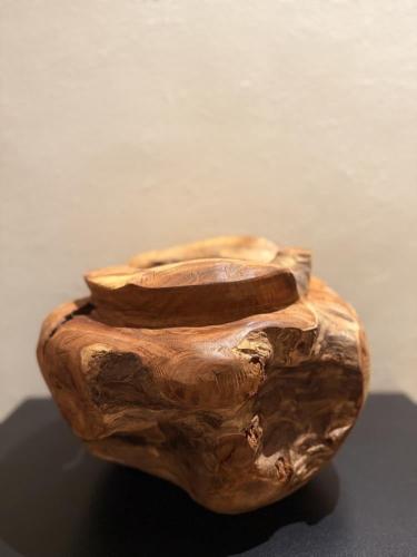 A vase made of teak wood, height 25, diameter 23