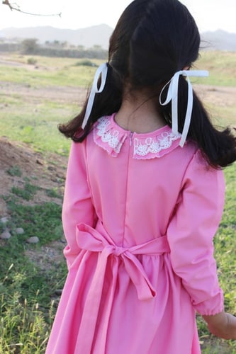 مريول بياقة دائرية وكم زم