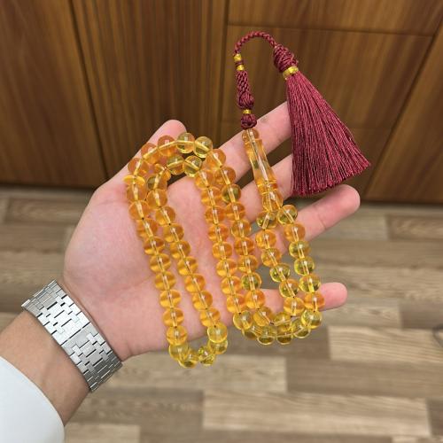 مستكة شبيه الكهرمان ذروي