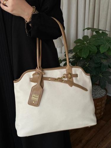 حقيبة ميو ميو