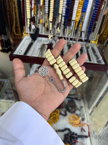 Beige color prayer beads