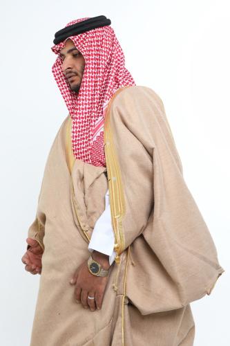 A beige royal Zari Bisht