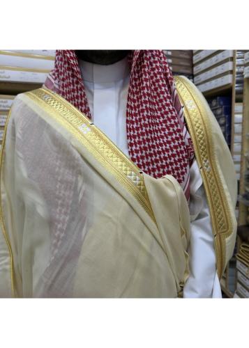 The distinguished Bisht is lemon-colored.