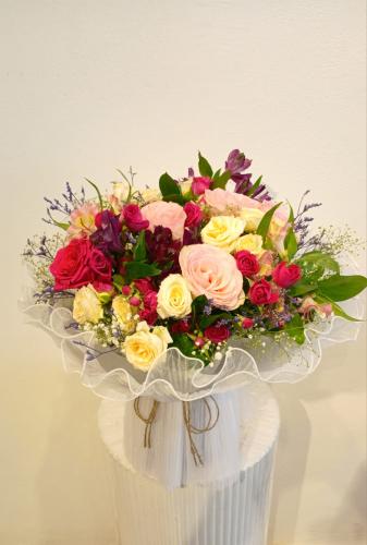 Mixed natural roses with baby rose and immortelle,...