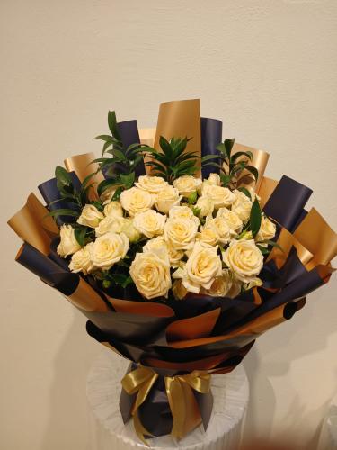 A bouquet of natural Baby Rose flowers with Rexros...