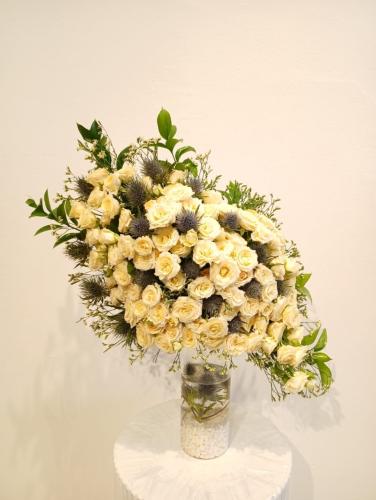 Transparent vase with baby rose