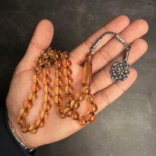 مسباح بكلايت عسلي شفاف