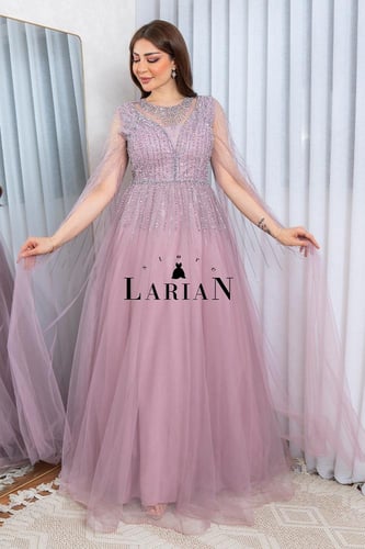 فستان سهره باكمام طويل من التل ذات فصوص ابداعيه عل...