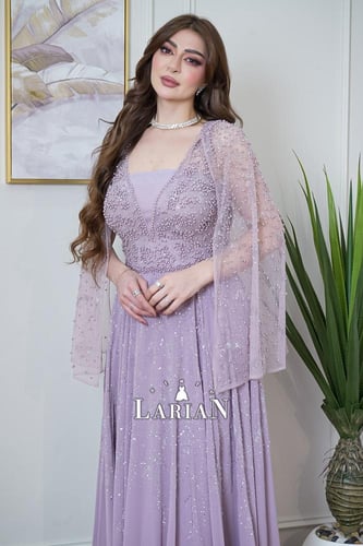 فستان سهره موف ناعم راقي باكمام فراشه وتطريز من ال...