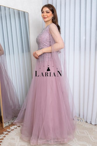 فستان سهره باكمام طويل من التل ذات فصوص ابداعيه عل...